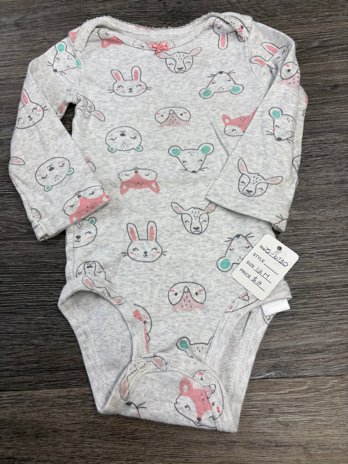 12 M “Carter’s” Onesie
