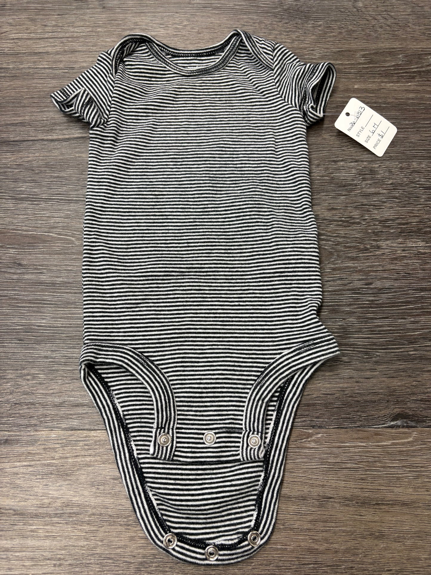 6 M “Carter’s” Onesie