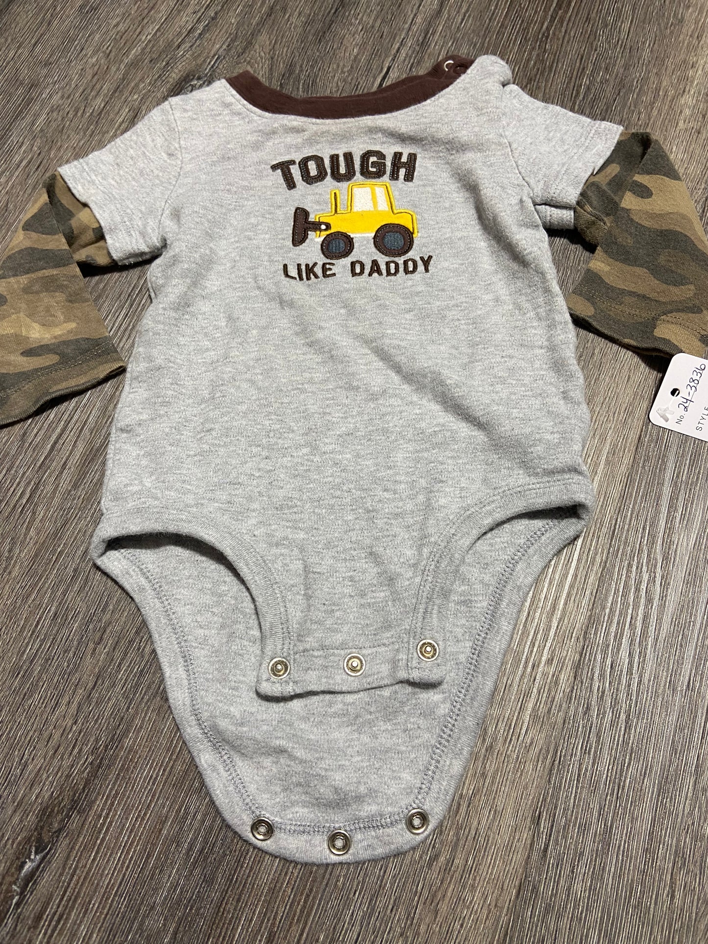 9 M “Carter’s” Onesie