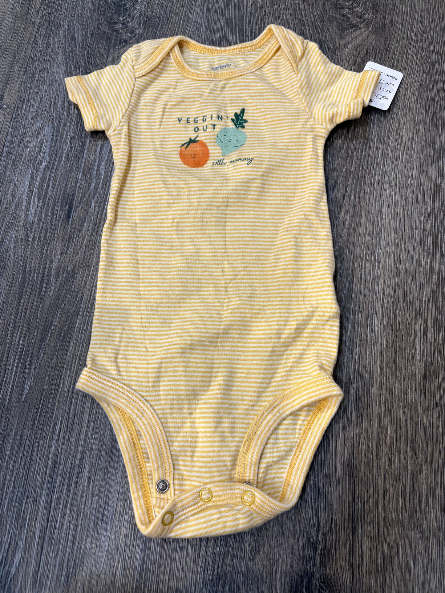 9 M “Carter’s” Onesie