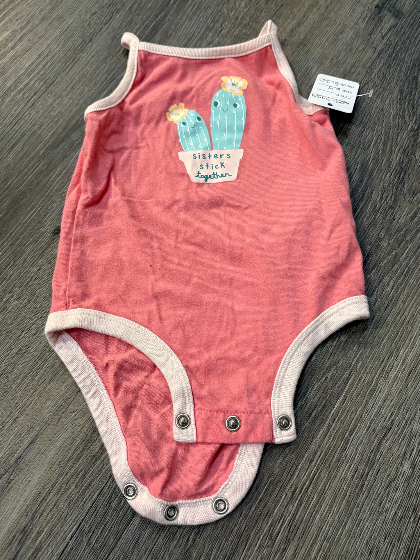 6 M “Carter’s” Onesie