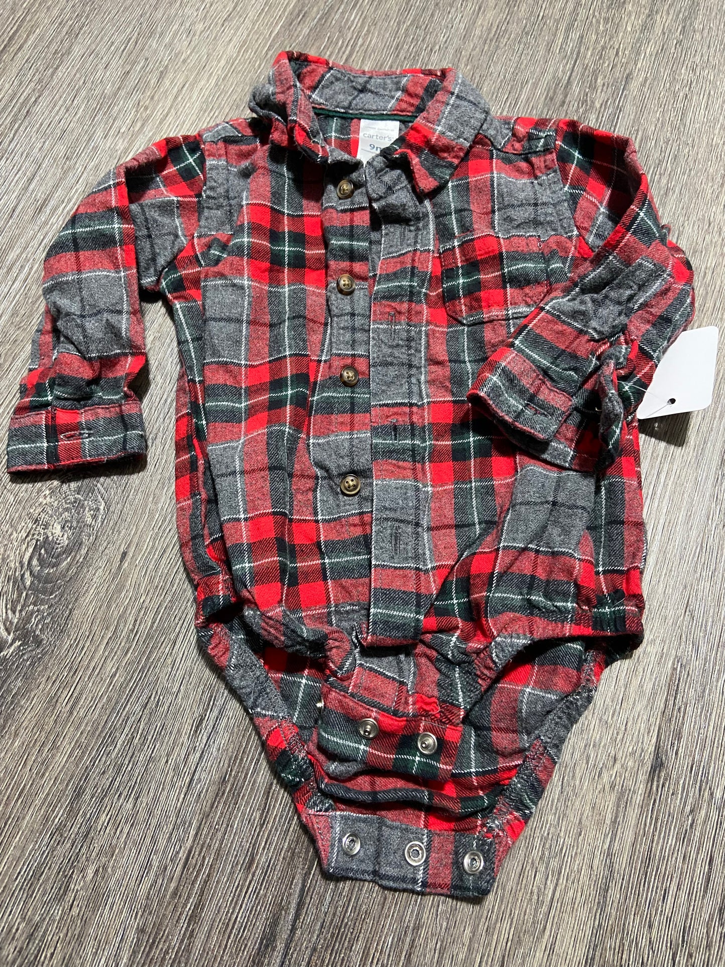 9 M “Carter’s” Onesie