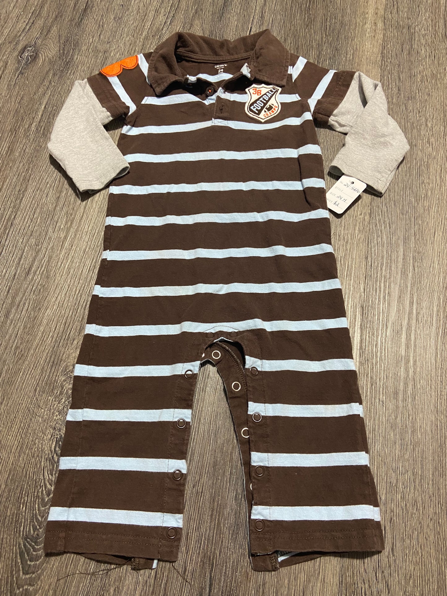 24 M “Carter’s” Romper