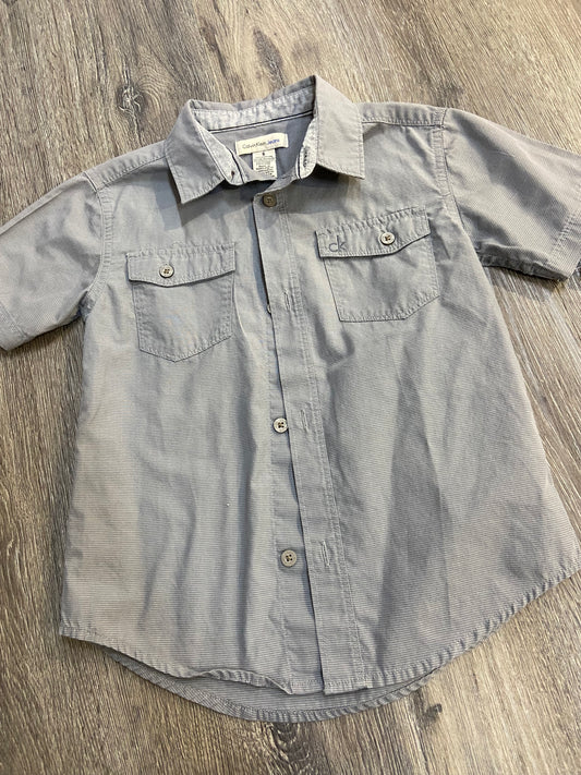 6 “Calvin Klein” Button Down