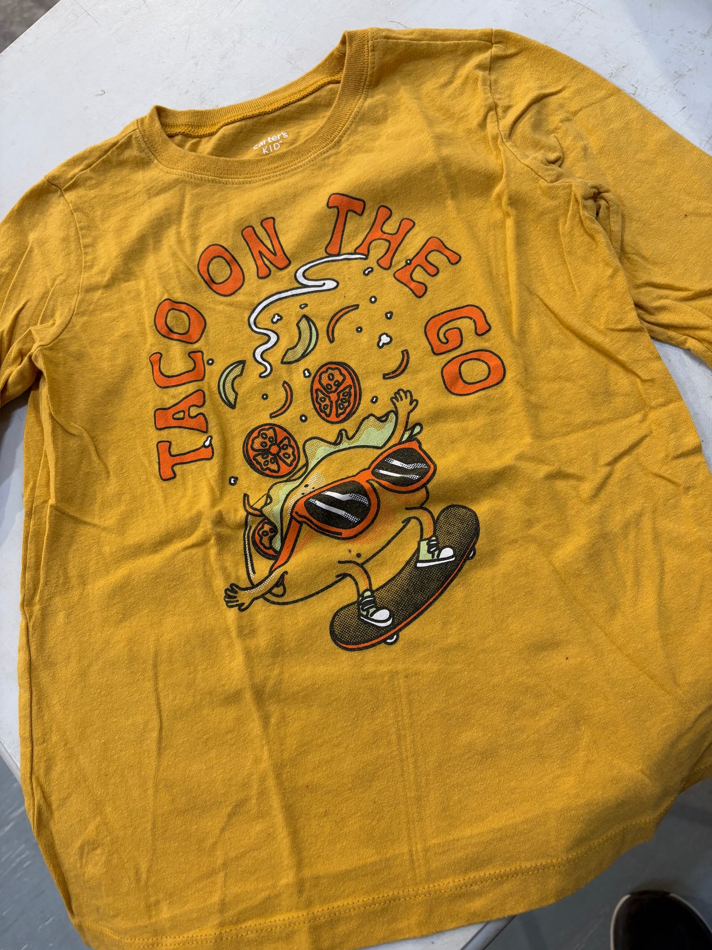 7 “Carter’s Kid” Shirt