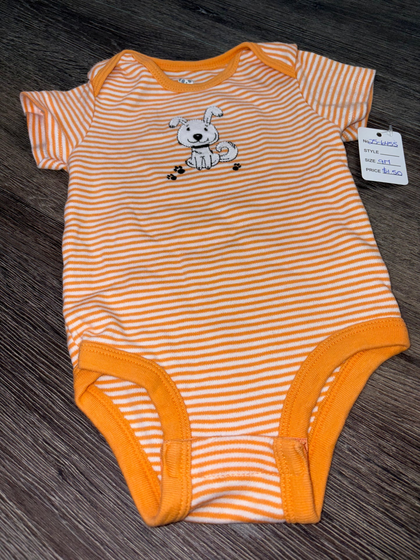 9 M “Rococo” Onesie