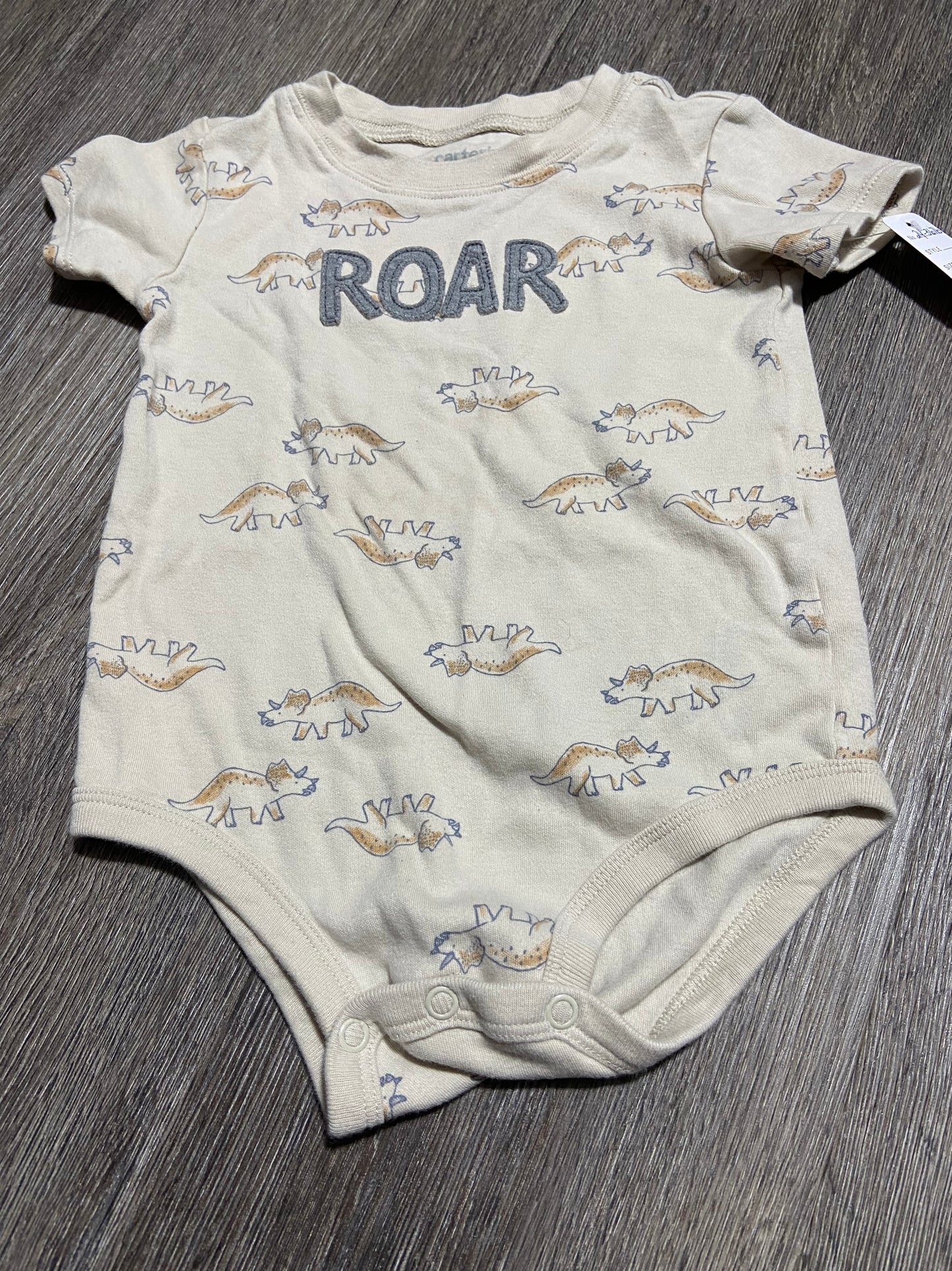 24 M “Carter’s” Onesie