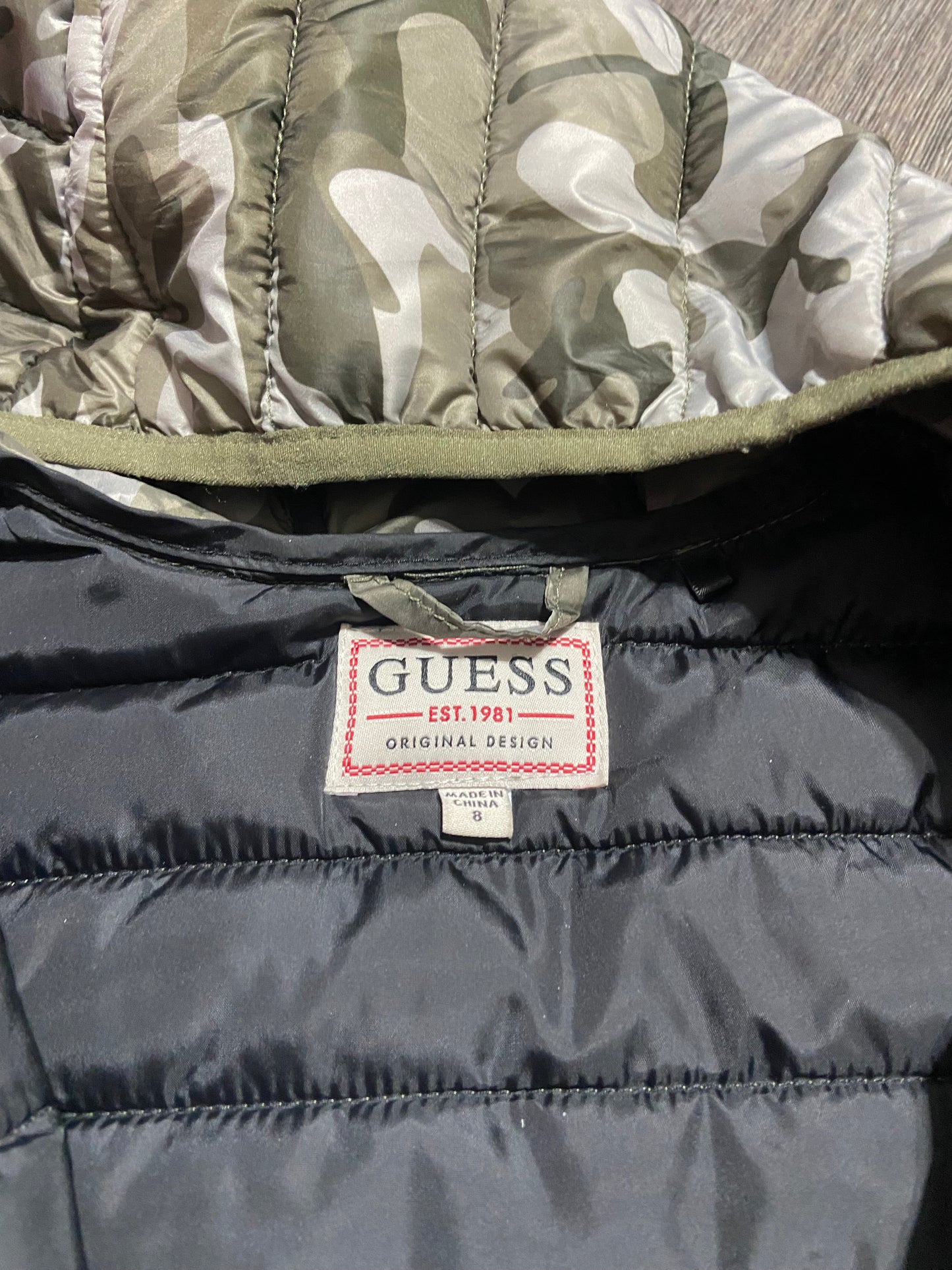 8 “Guess” Puffer Jacket