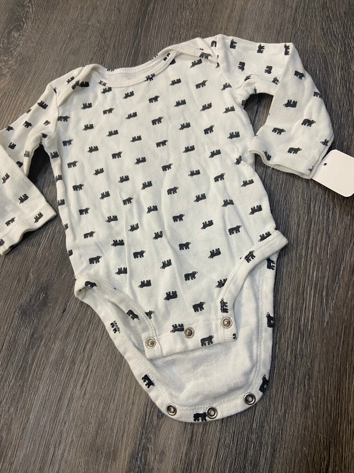 9 M “Carter’s” Onesie