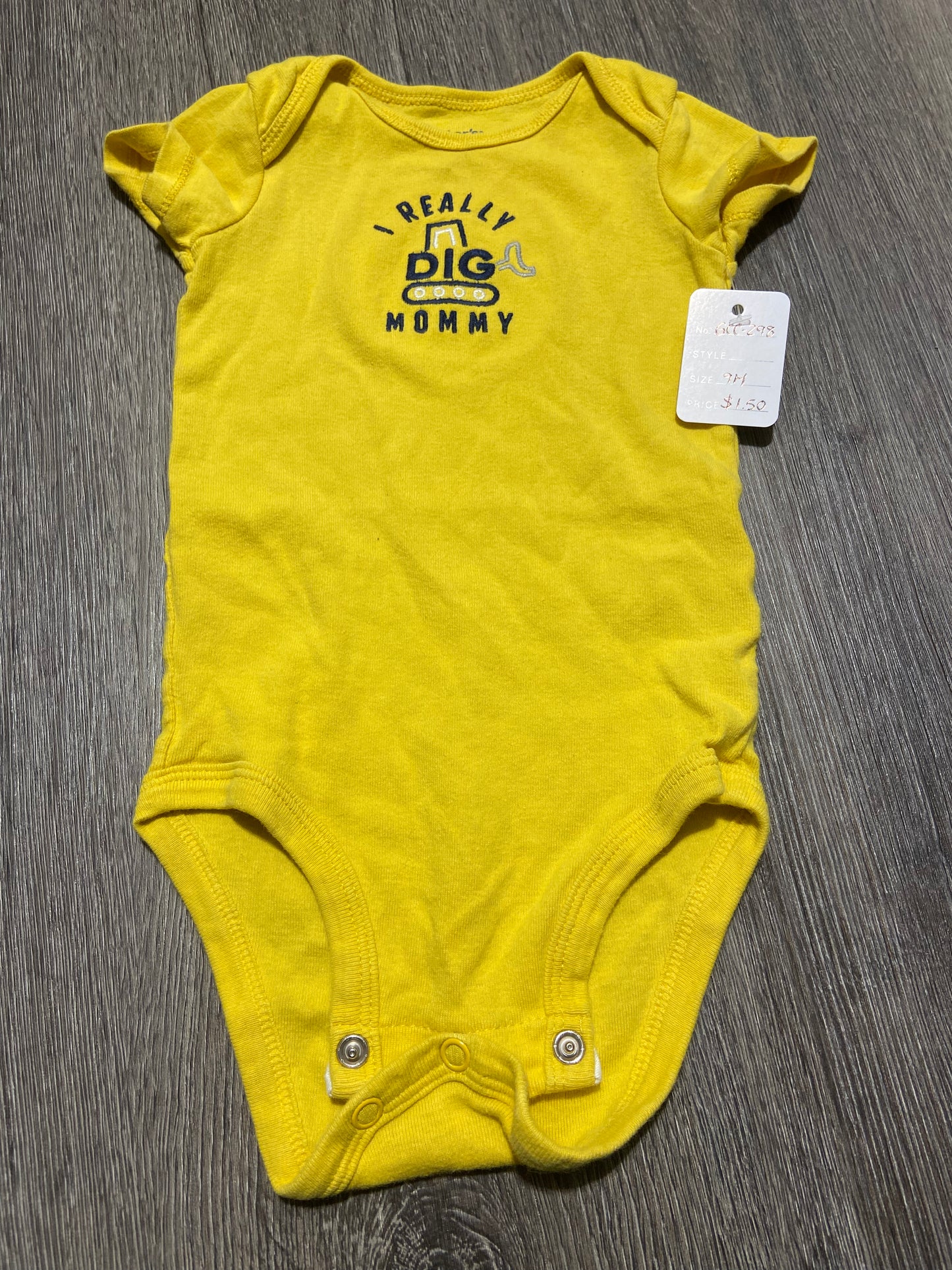 9 M “Carter’s” Onesie