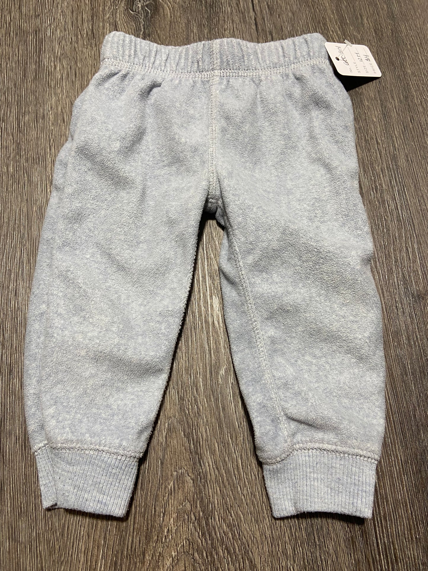 12 M “Carter’s” Fleece Pants (Light Blue)