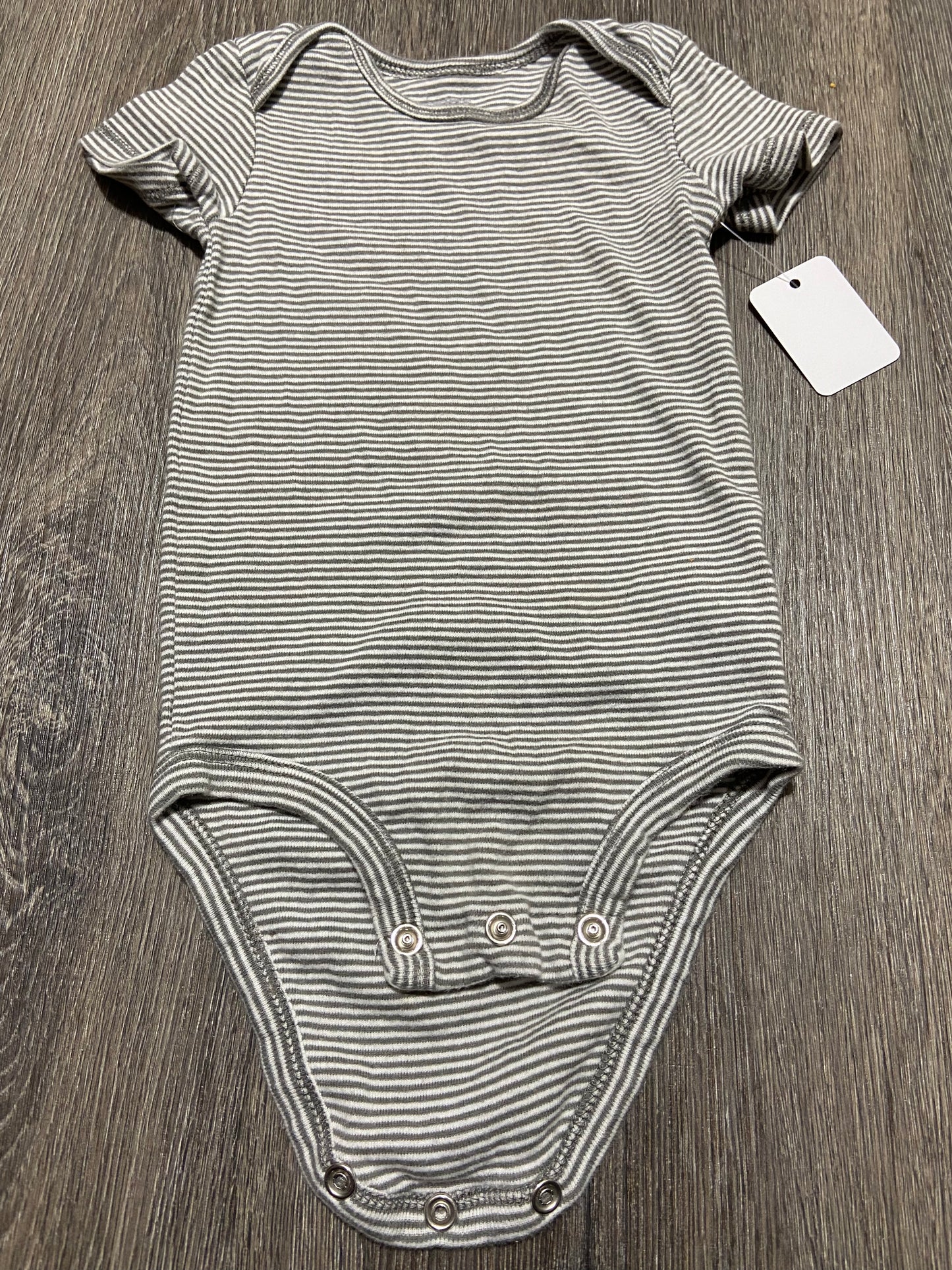 12 M “Carter’s” Onesie