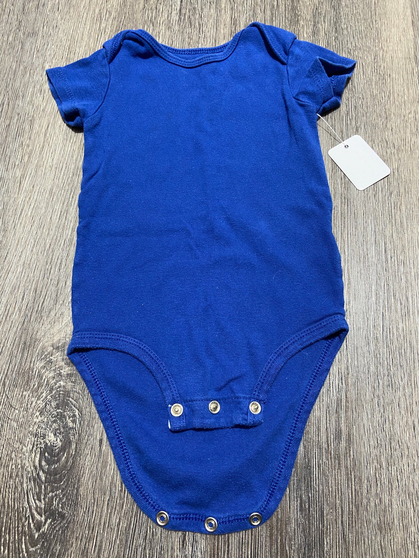 12 M “Carter’s” Onesie